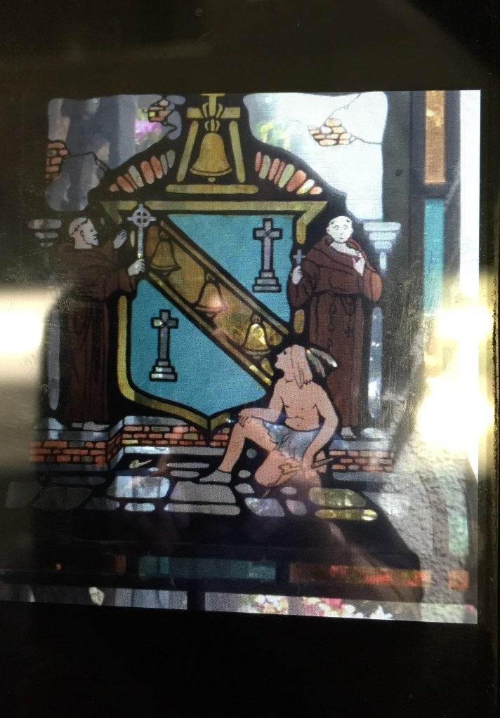 stained glass window in a Catholic church