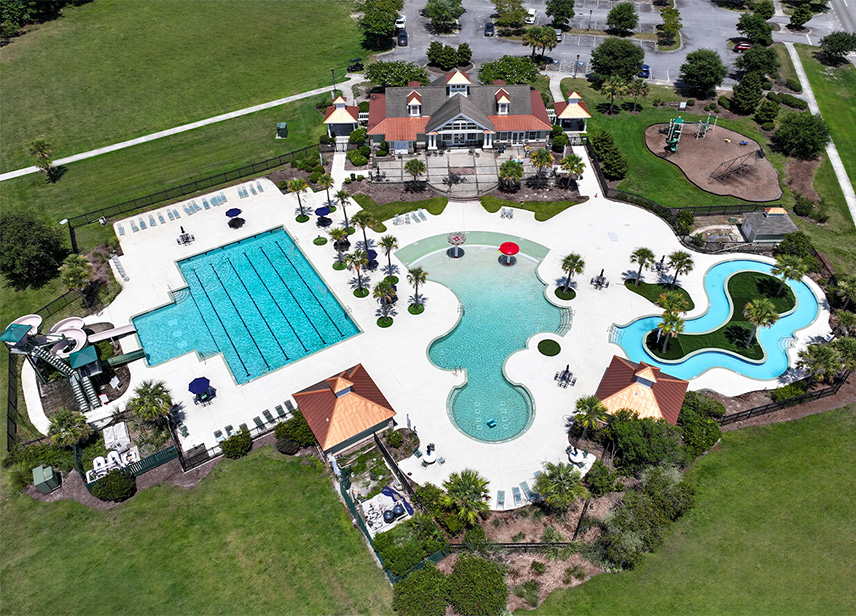 Aerial photo of swimming pools at the Rice Hope Plantation housing development